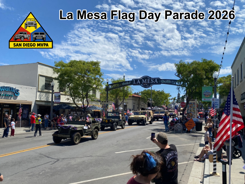 Willys Jeeps and Humvees marching under La Mesa arch